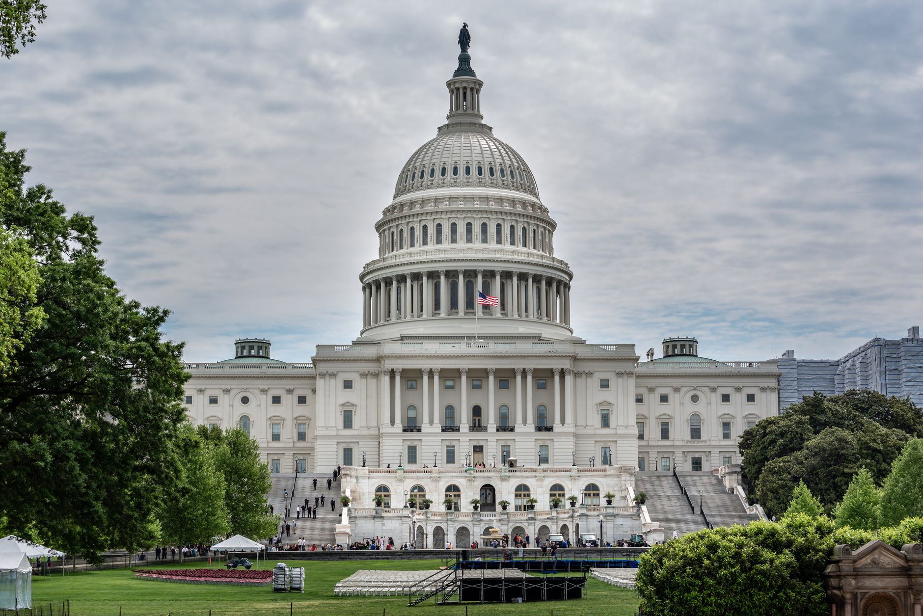 Striking view of the US Capitol sitting majestically in Washington, DC, under a cloudy sky.