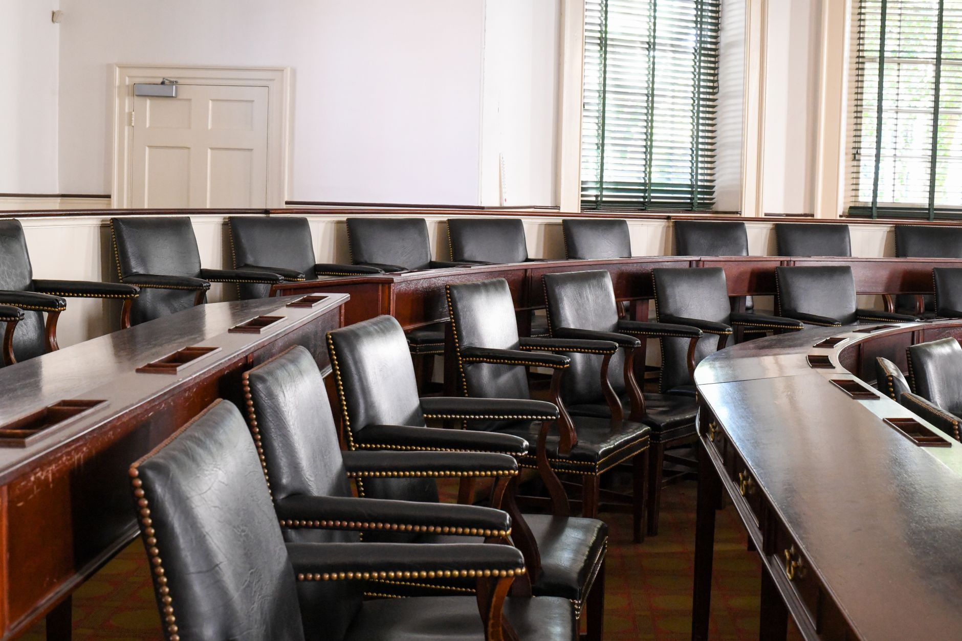 Interior view of Congress Hall with classic wooden seating arrangements in Philadelphia.